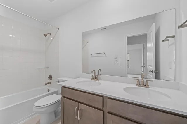 a view of empty room with windows