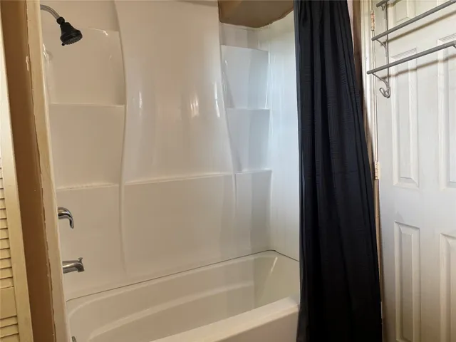 a close view of a bathtub in bathroom
