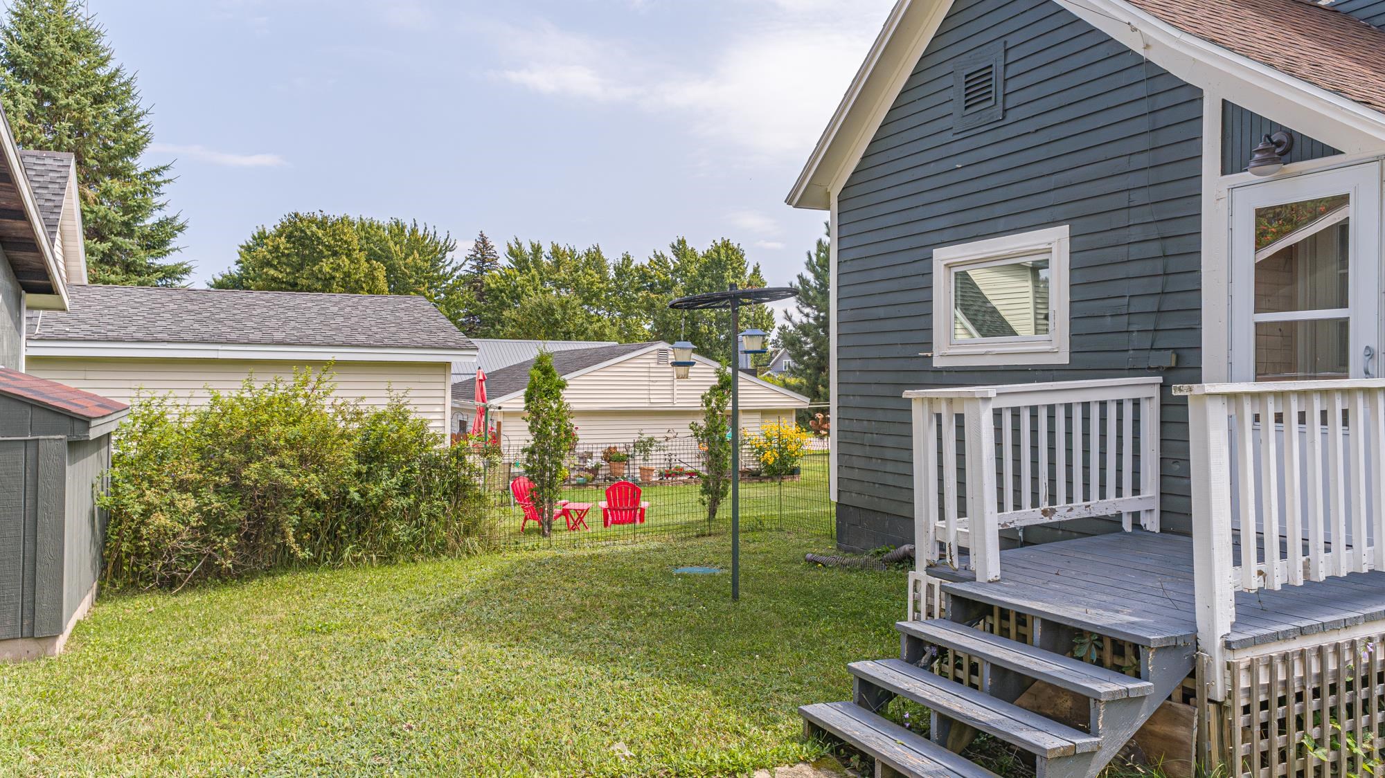 1151 East Camp Street Ely, MN 55731 - Photo 3 of 45 View of yard featuring a deck