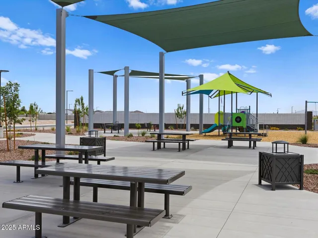 a swimming pool with chairs