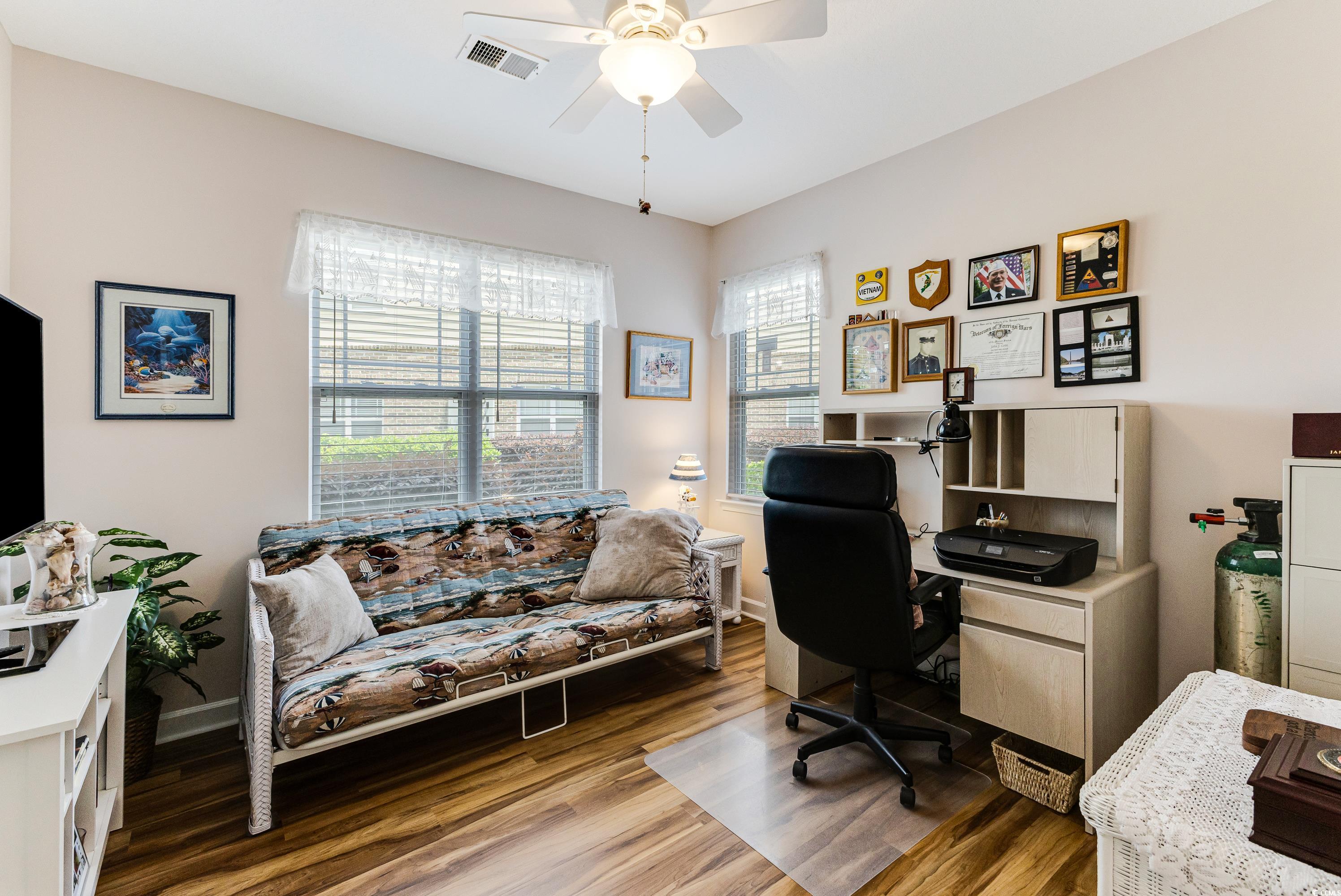 260 Woodlands Way, Unit 2 Calabash, NC 28467 - Photo 22 of 40 Office area featuring wood finished floors, a ceiling fan, and baseboards