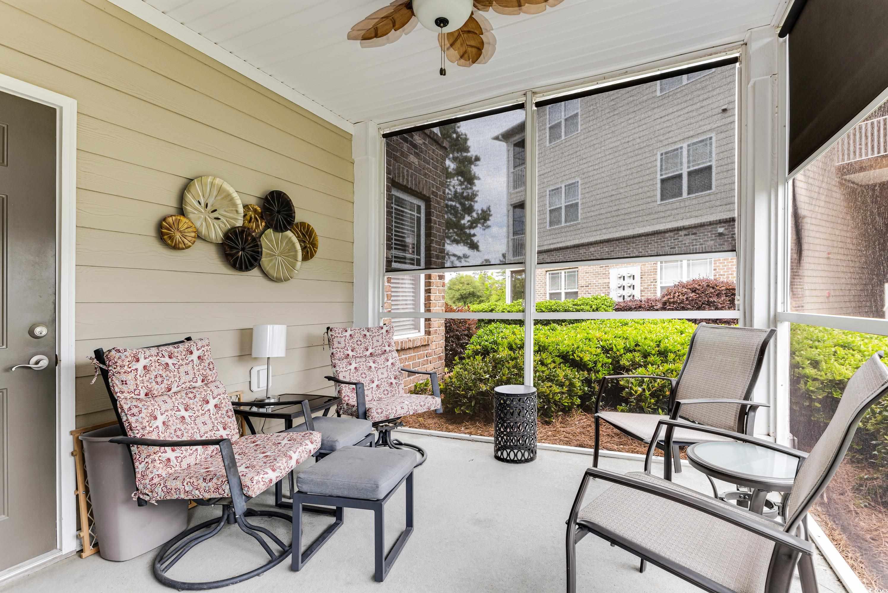 260 Woodlands Way, Unit 2 Calabash, NC 28467 - Photo 25 of 40 Sunroom / solarium with a ceiling fan