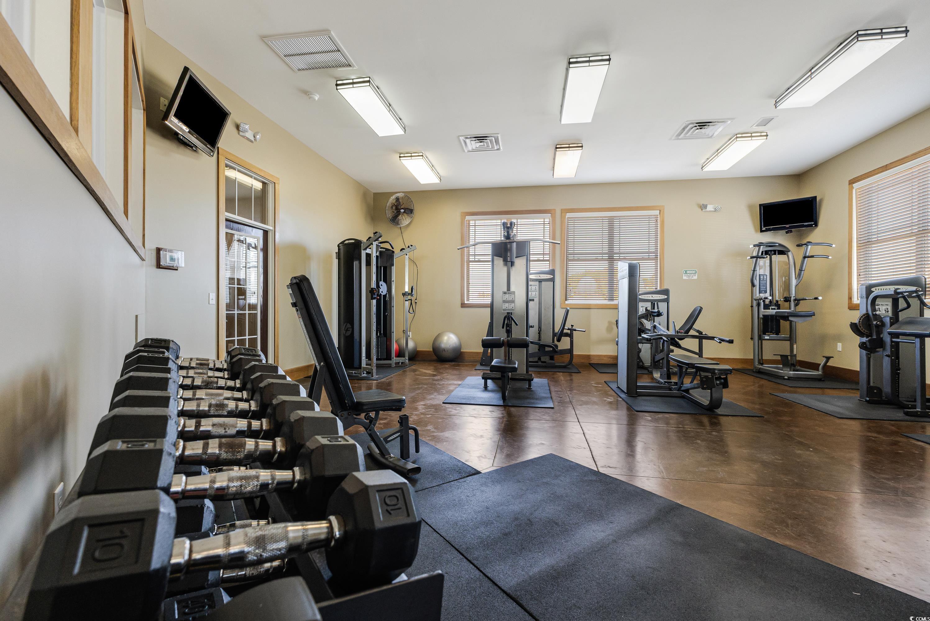 260 Woodlands Way, Unit 2 Calabash, NC 28467 - Photo 36 of 40 Workout area with baseboards