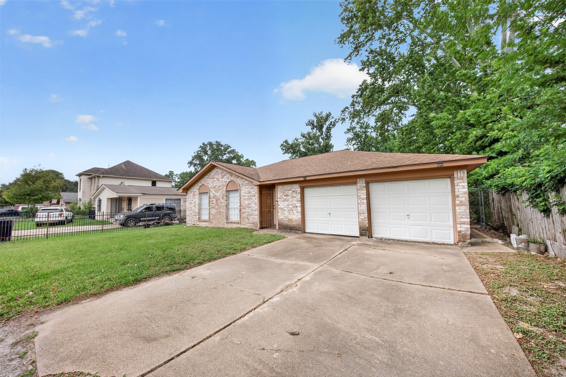 8029 Tareyton Lane Houston, TX 77075 - Photo 1 of 20 a view of a house with a yard and large tree
