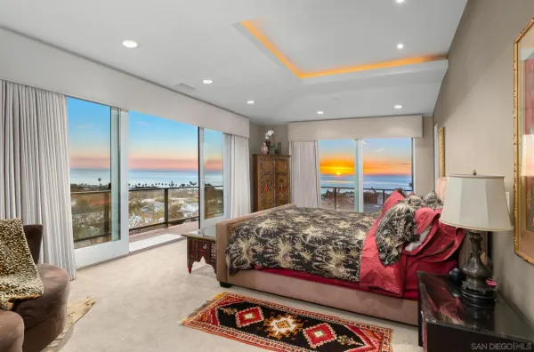 a bed room with a bed and a couch