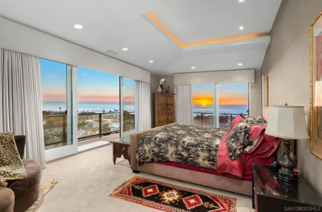 a bed room with a bed and a couch