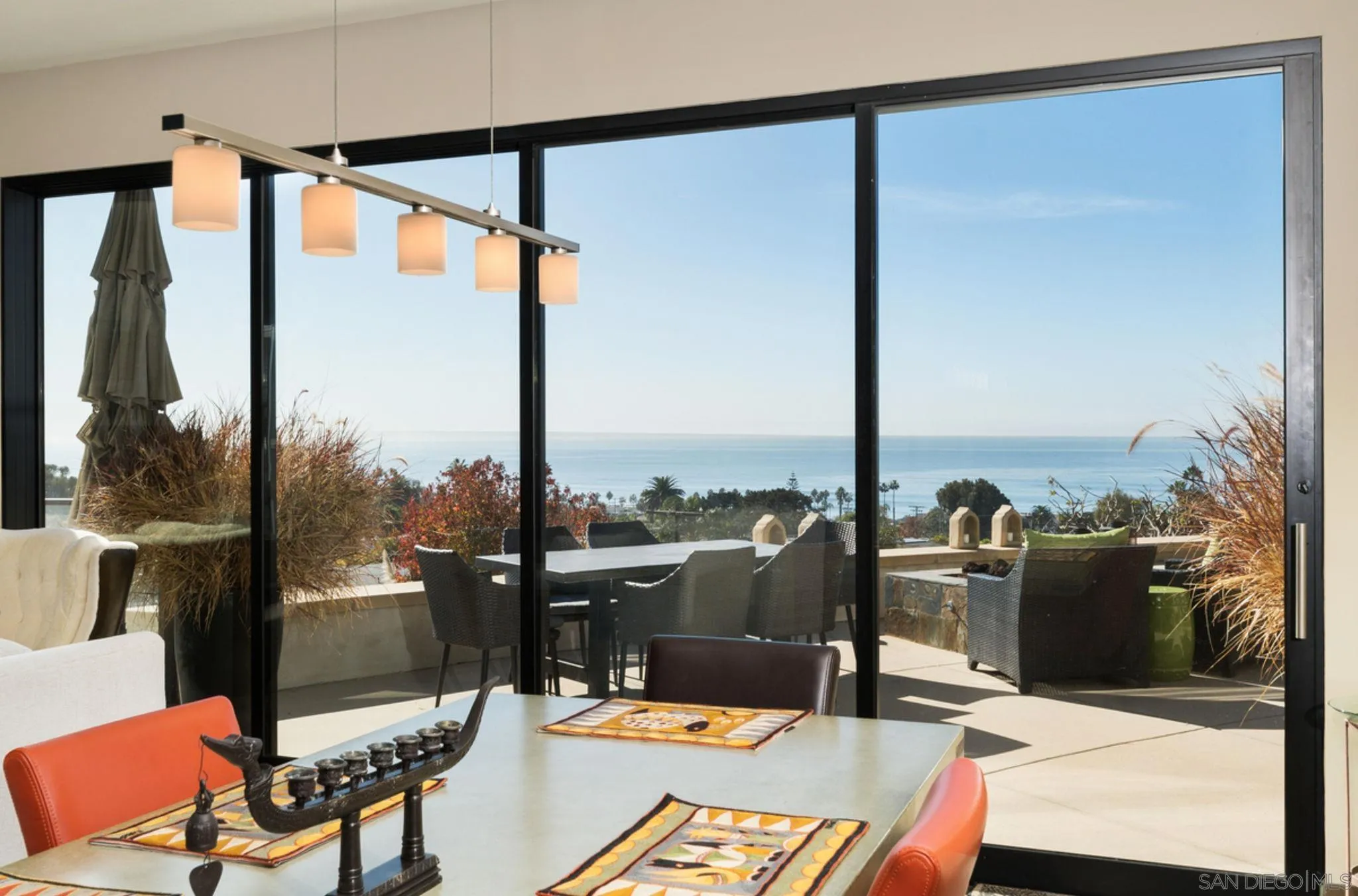 5680 Linda Rosa Avenue La Jolla, CA 92037 - Photo 8 of 24 a view of a city from a dining room