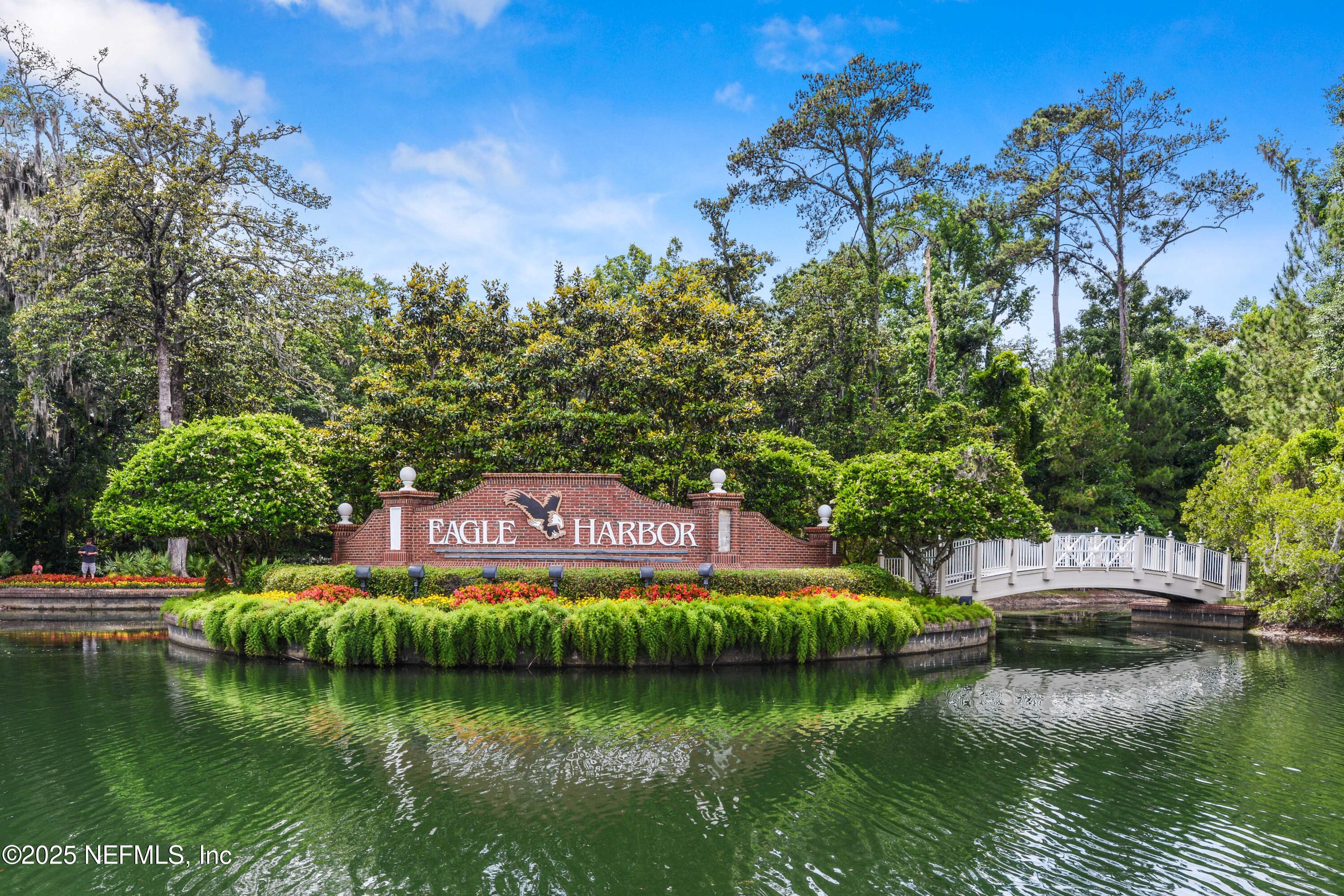 1655 Highland View Court Fleming Island, FL 32003 - Photo 3 of 56 a view of a lake with houses in outdoor space