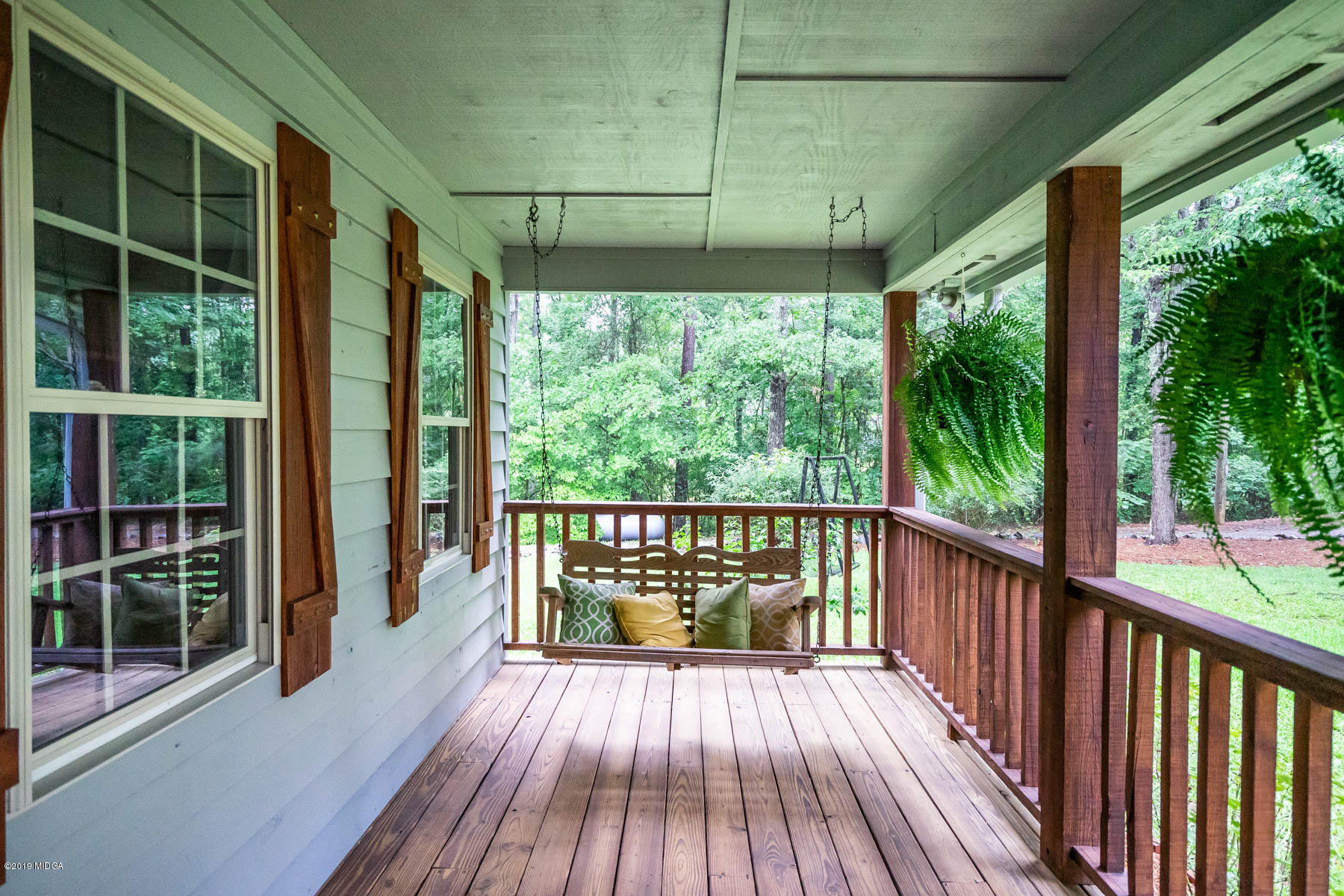 5934 Dames Ferry Road Juliette, GA 31046 - Photo 2 of 41 a view of a balcony with wooden floor