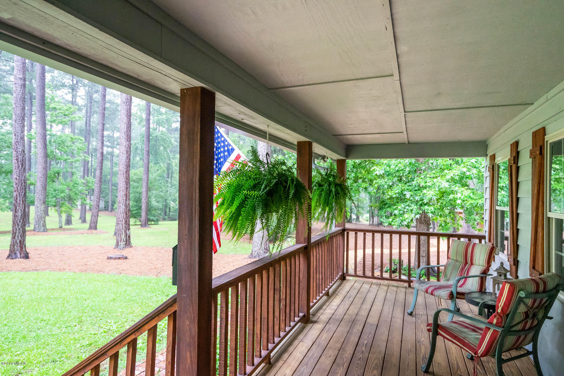 5934 Dames Ferry Road Juliette, GA 31046 - Photo 3 of 41 a view of a porch with wooden floor and outdoor space