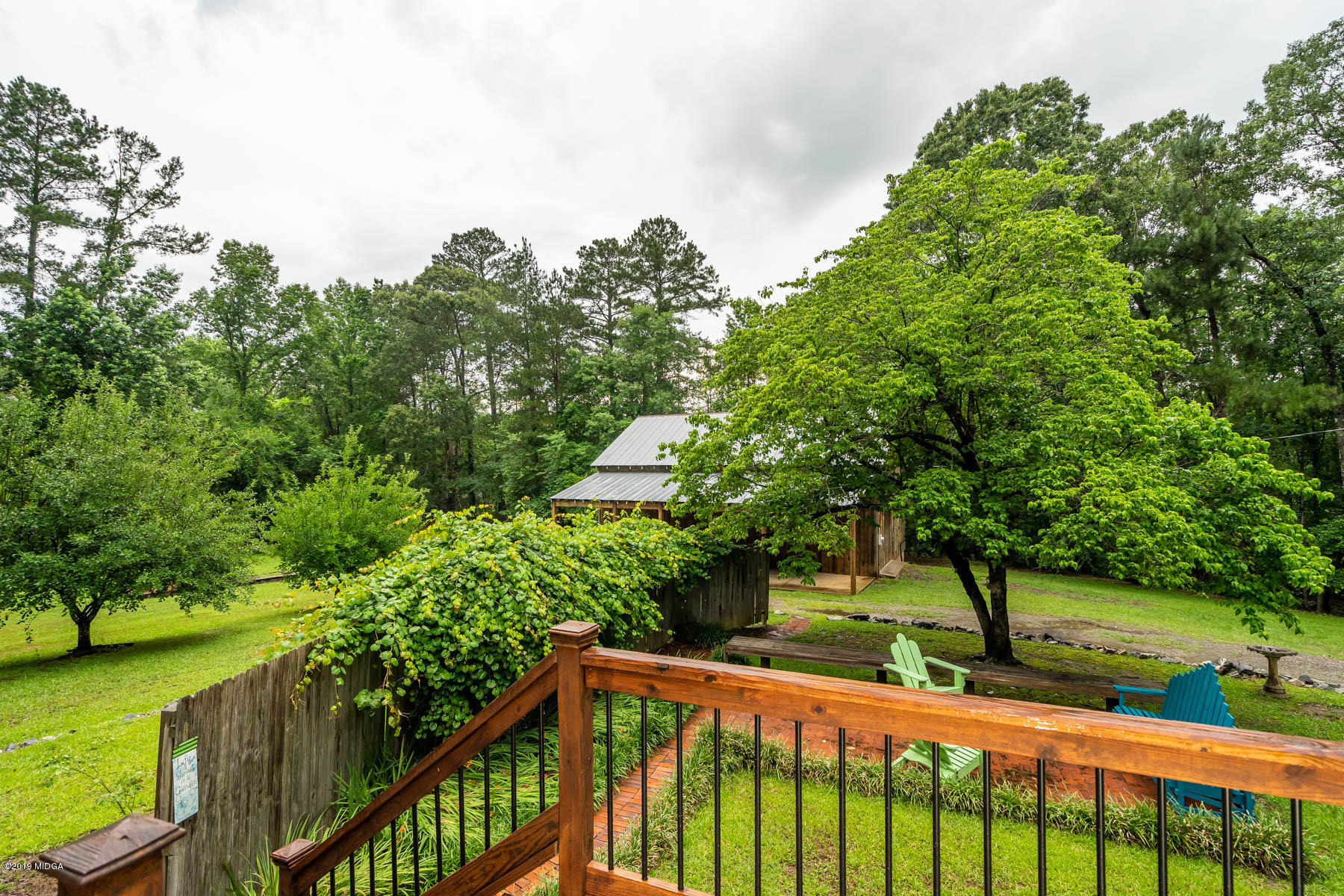 5934 Dames Ferry Road Juliette, GA 31046 - Photo 27 of 41 a view of a street with a tree in the background