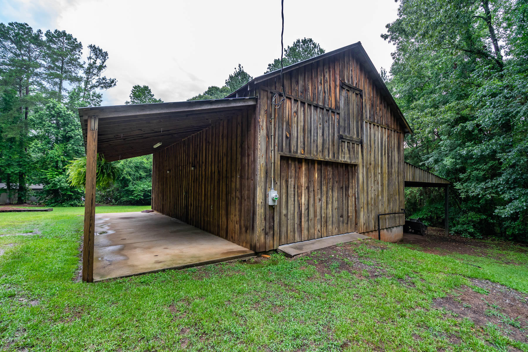 5934 Dames Ferry Road Juliette, GA 31046 - Photo 34 of 41 a view of a backyard with wooden fence