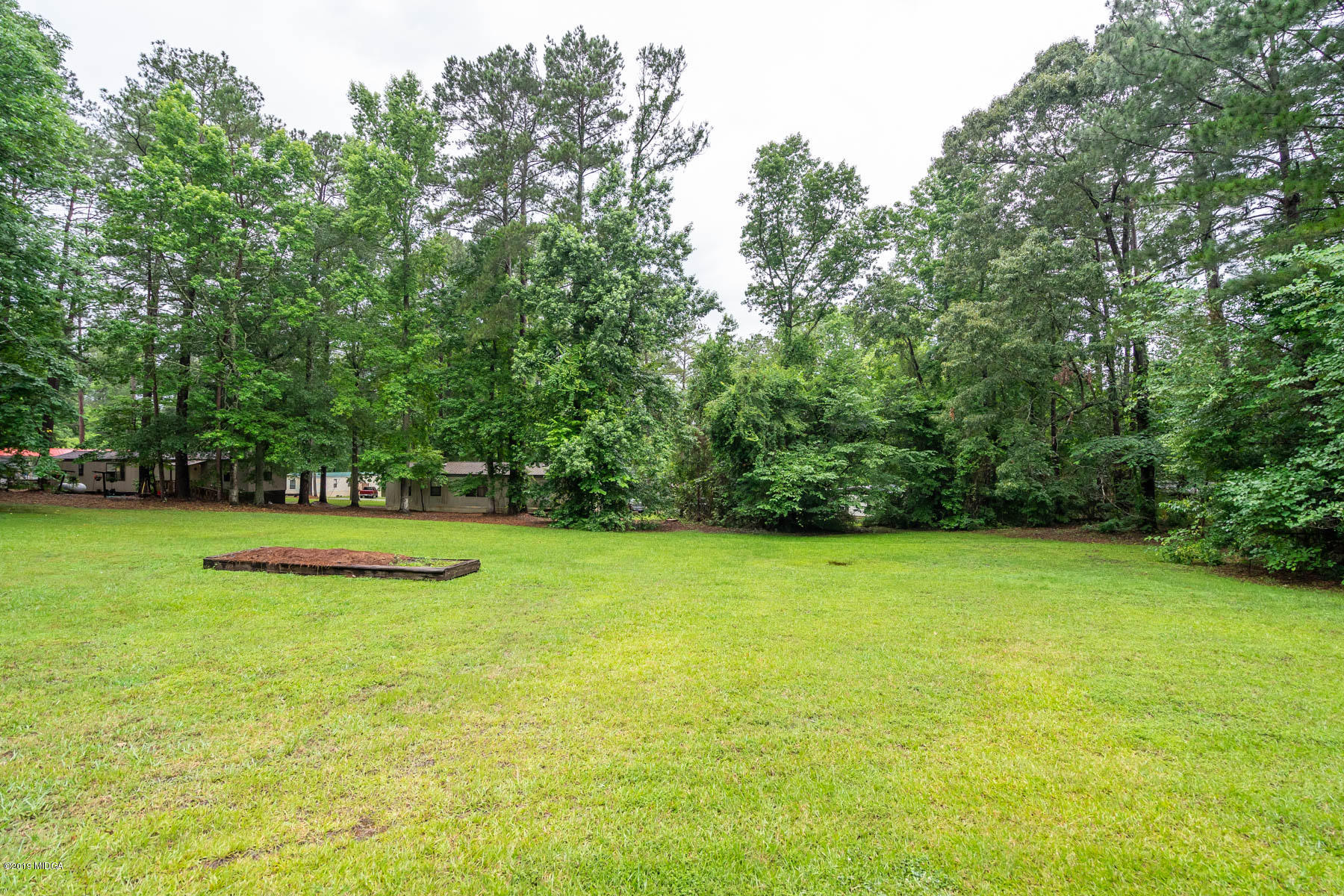 5934 Dames Ferry Road Juliette, GA 31046 - Photo 36 of 41 a view of a trees and basketball court