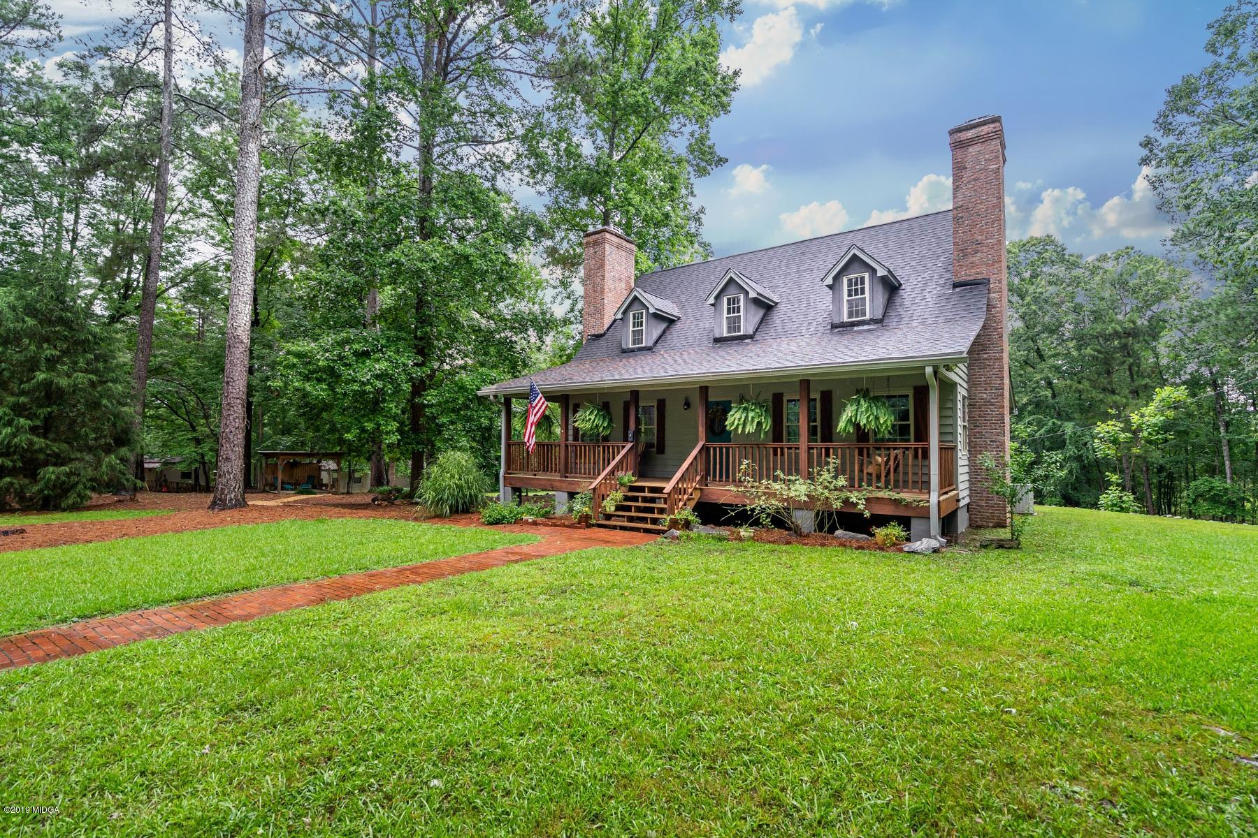 5934 Dames Ferry Road Juliette, GA 31046 - Photo 40 of 41 a view of a park with large trees and plants