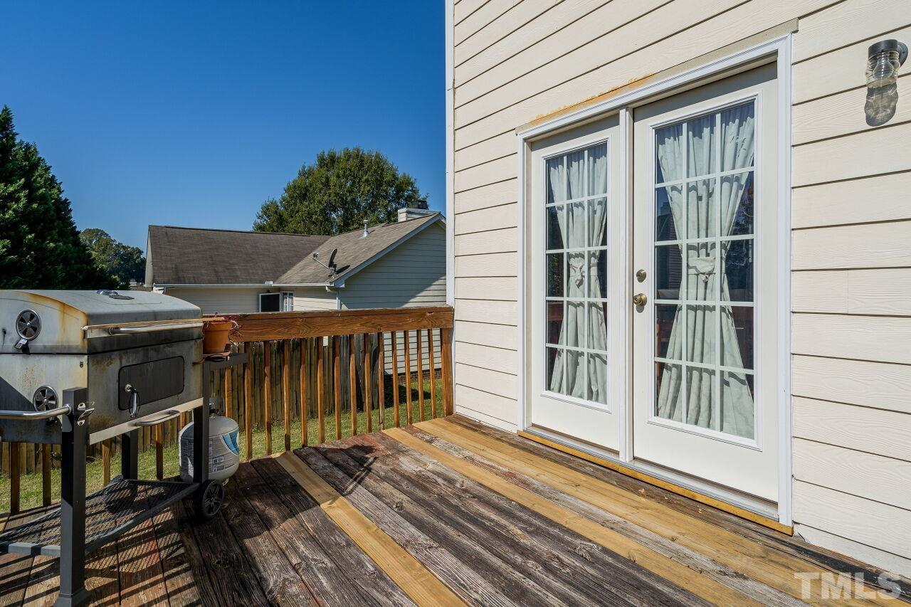 4428 Moss Spring Drive Raleigh, NC 27616 - Photo 23 of 27 a view of a house with a balcony