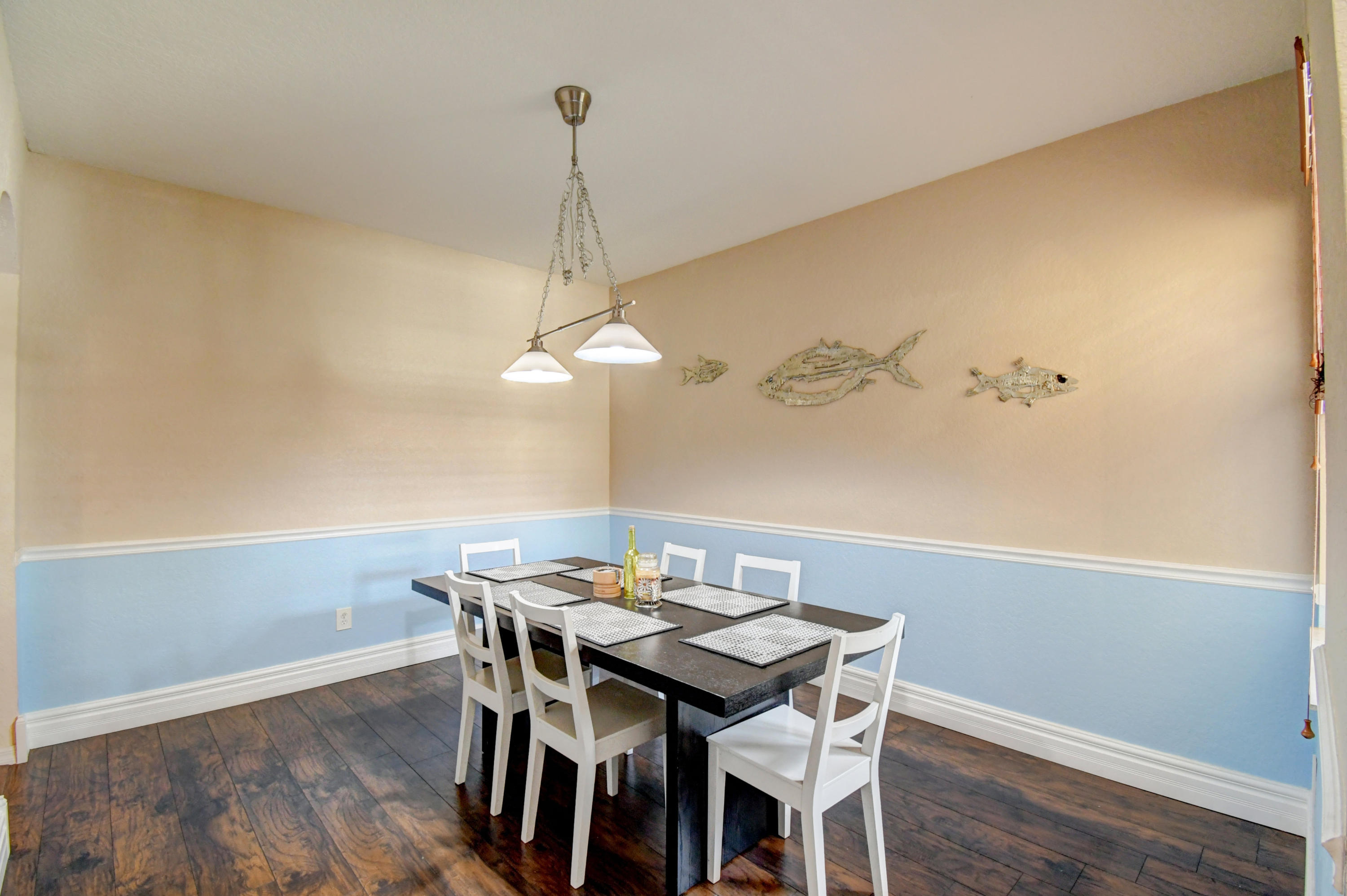 804 Quartz Terrace West Palm Beach, FL 33413 - Photo 14 of 65 a view of a dining room with a table and chairs
