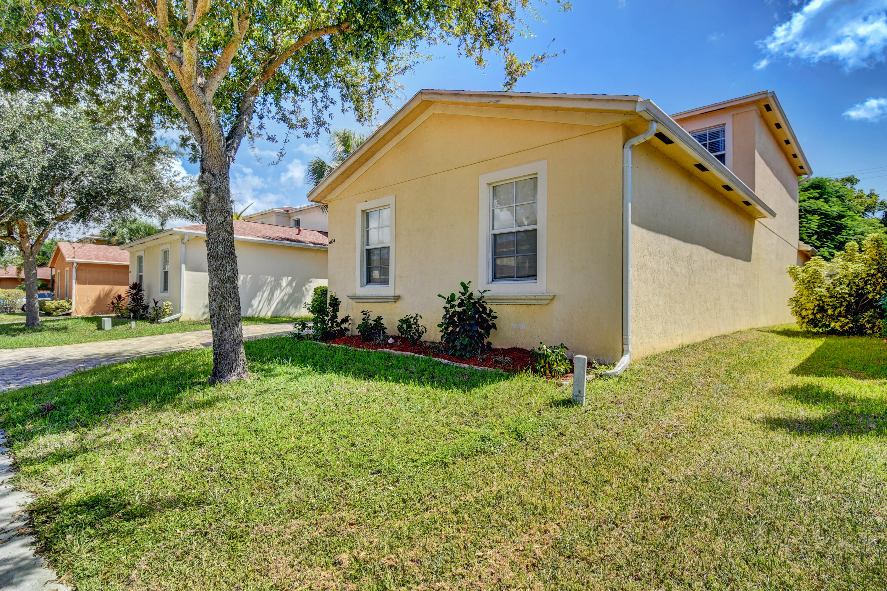 804 Quartz Terrace West Palm Beach, FL 33413 - Photo 3 of 65 a front view of house with yard