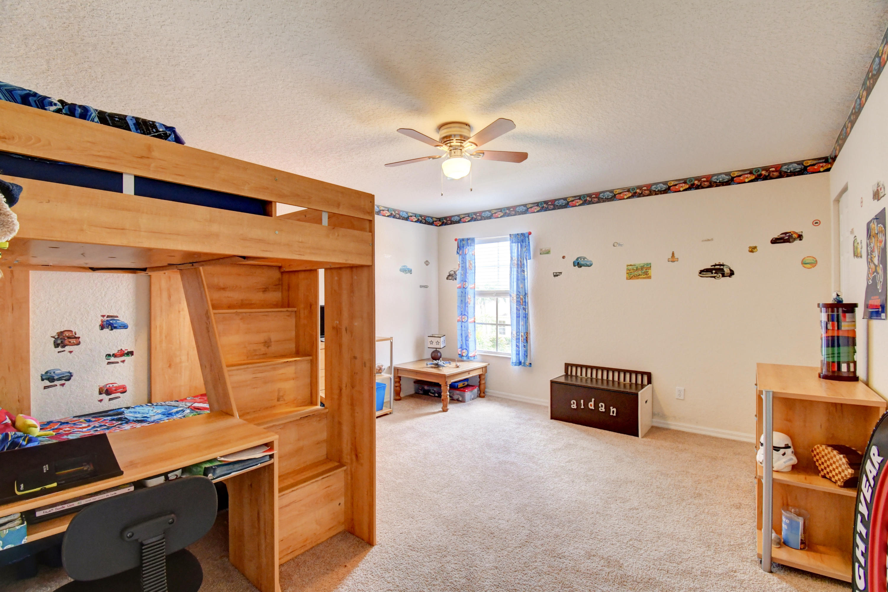 804 Quartz Terrace West Palm Beach, FL 33413 - Photo 35 of 65 a living room with furniture a table and a window
