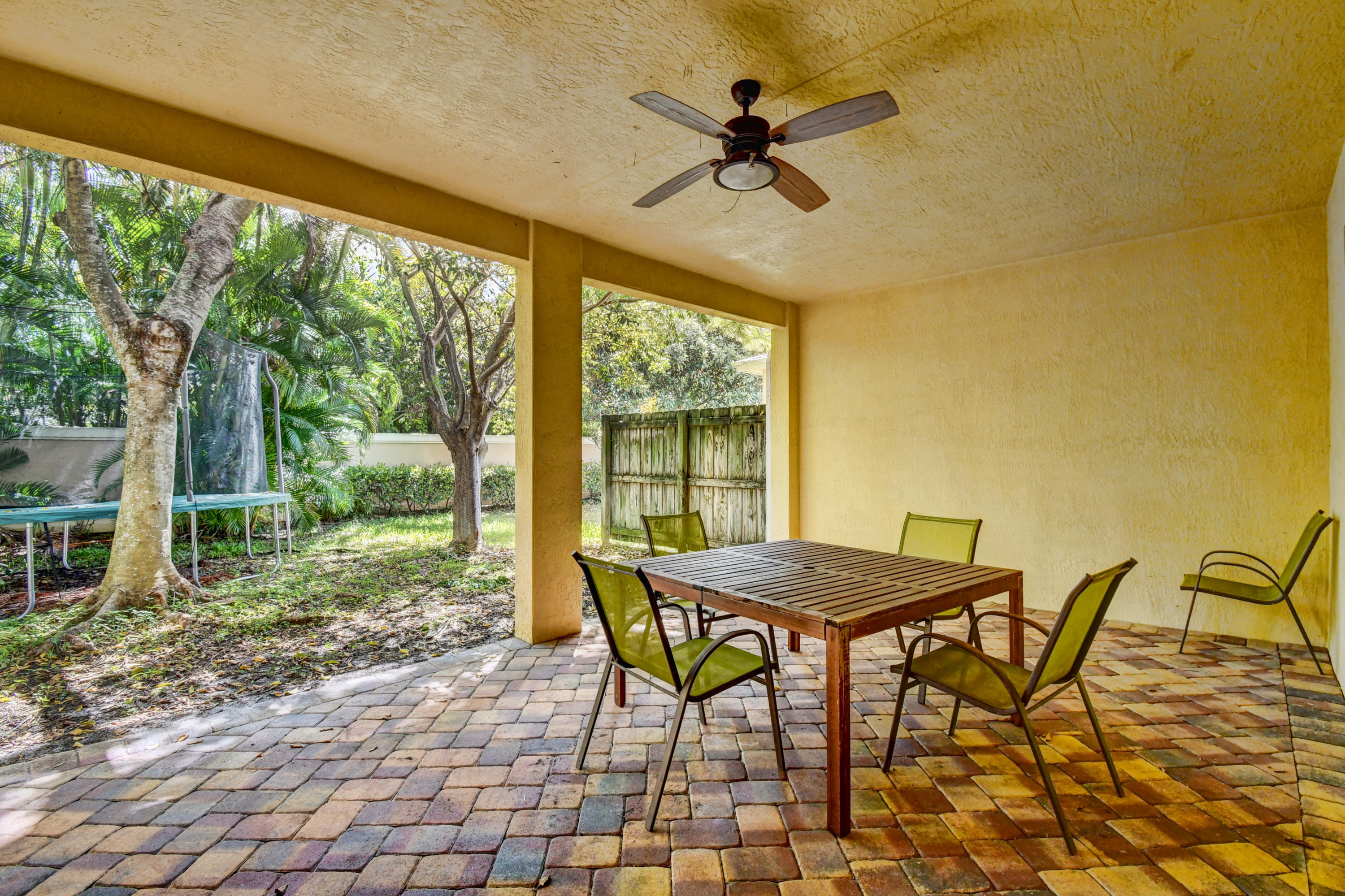 804 Quartz Terrace West Palm Beach, FL 33413 - Photo 47 of 65 a view of a dining room with furniture and a window