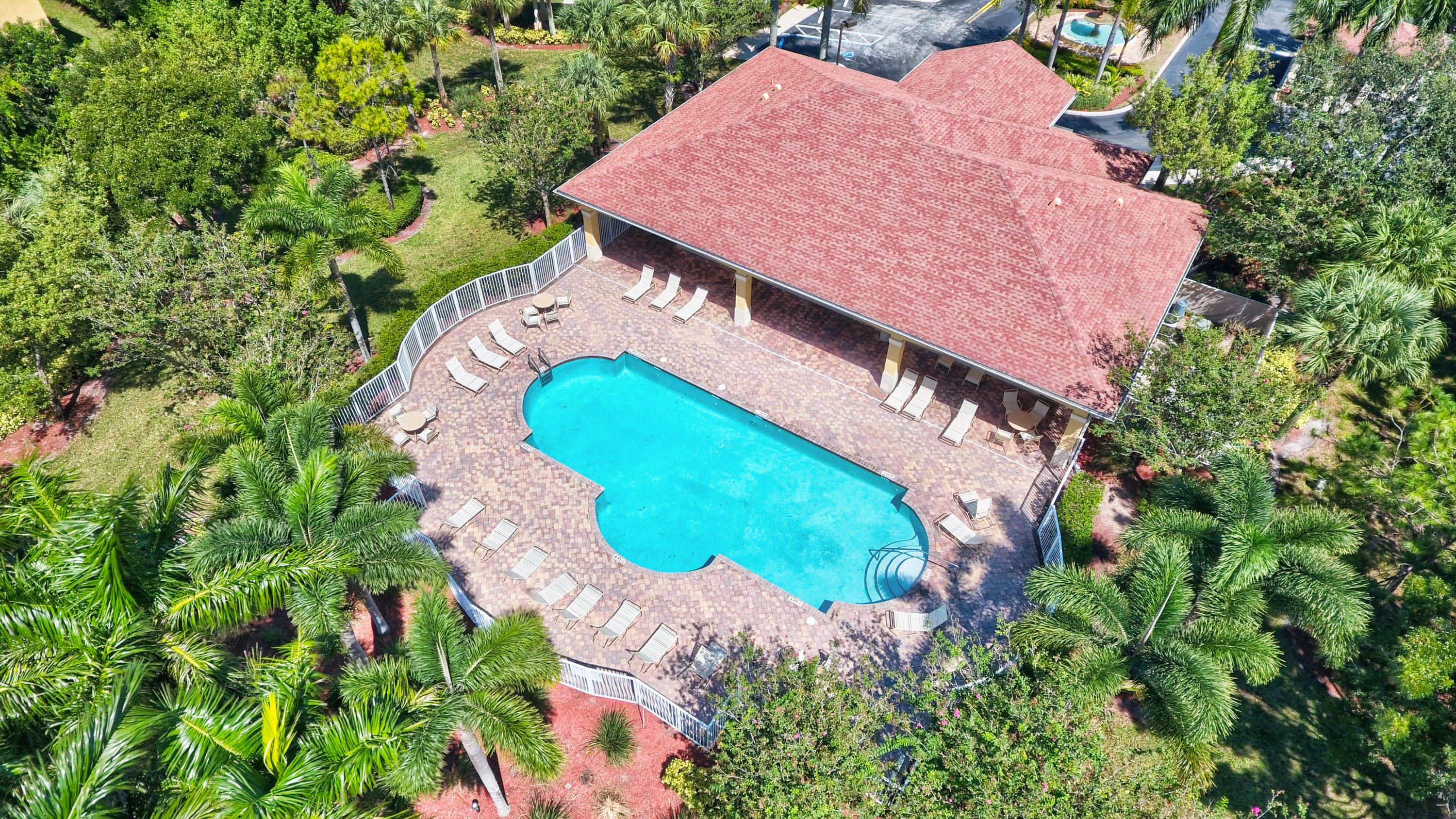 804 Quartz Terrace West Palm Beach, FL 33413 - Photo 55 of 65 an aerial view of a house with a swimming pool and garden