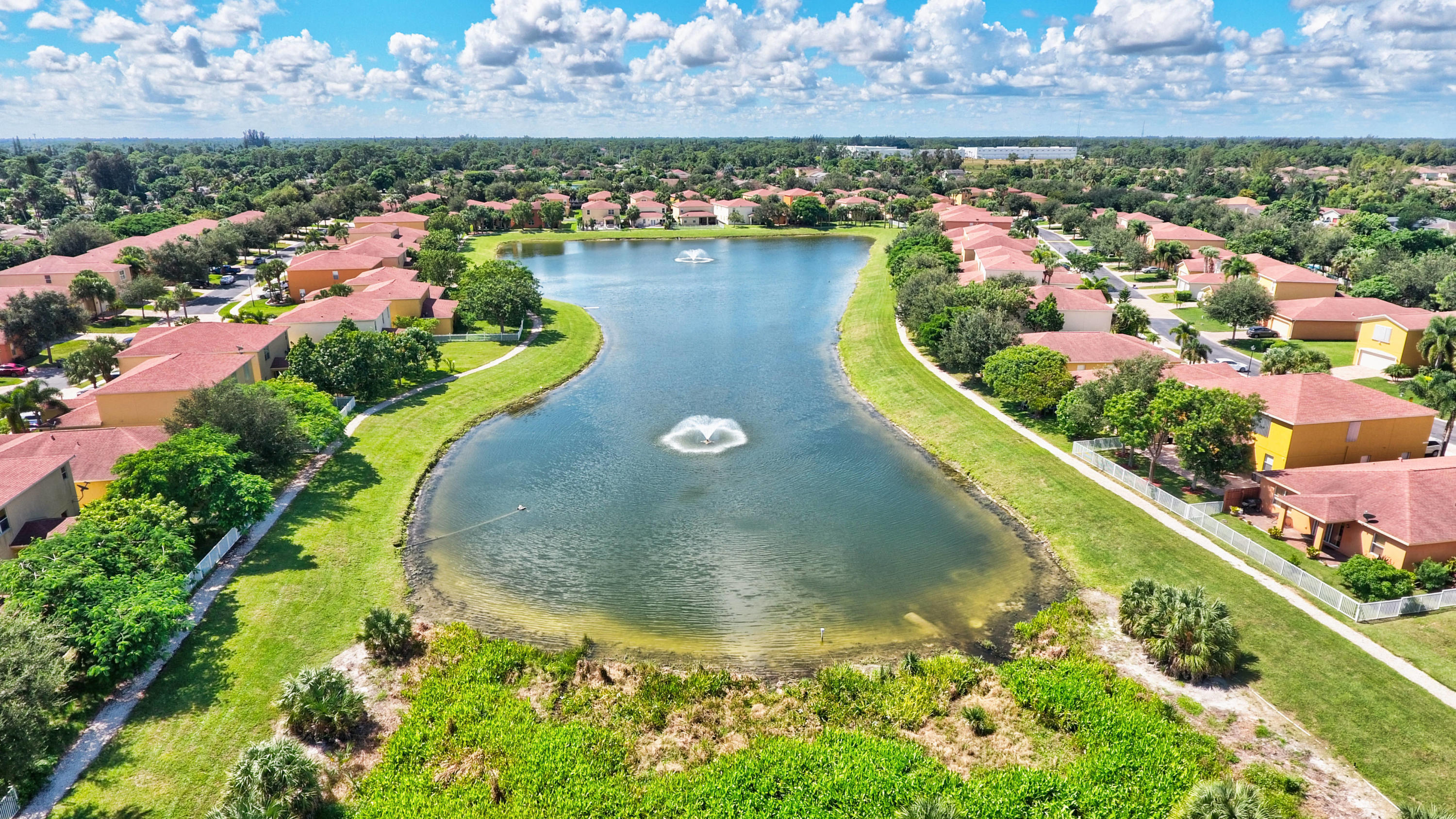 804 Quartz Terrace West Palm Beach, FL 33413 - Photo 56 of 65 an aerial view of a house with a lake view