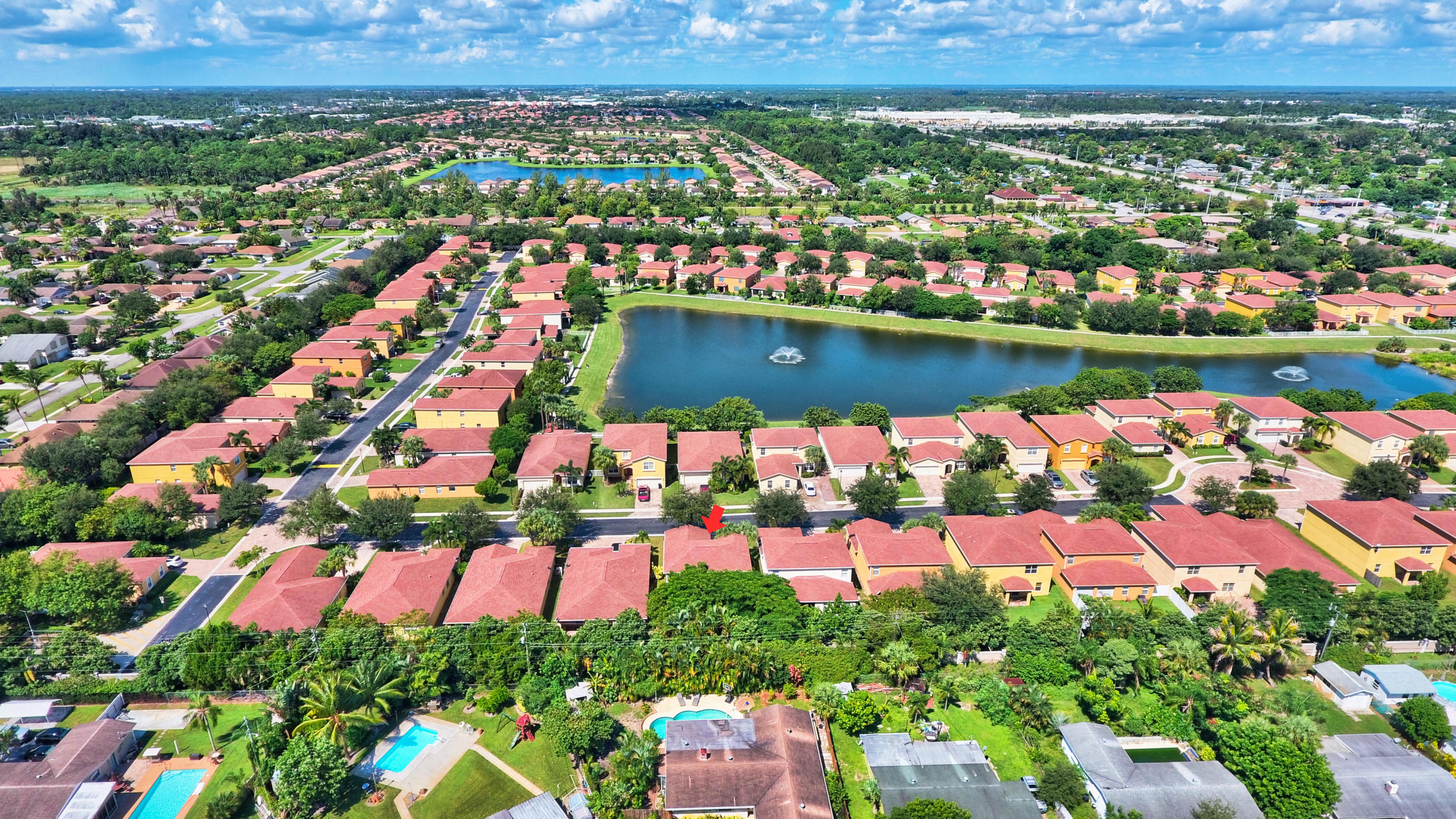 804 Quartz Terrace West Palm Beach, FL 33413 - Photo 6 of 65 an aerial view of residential building and lake