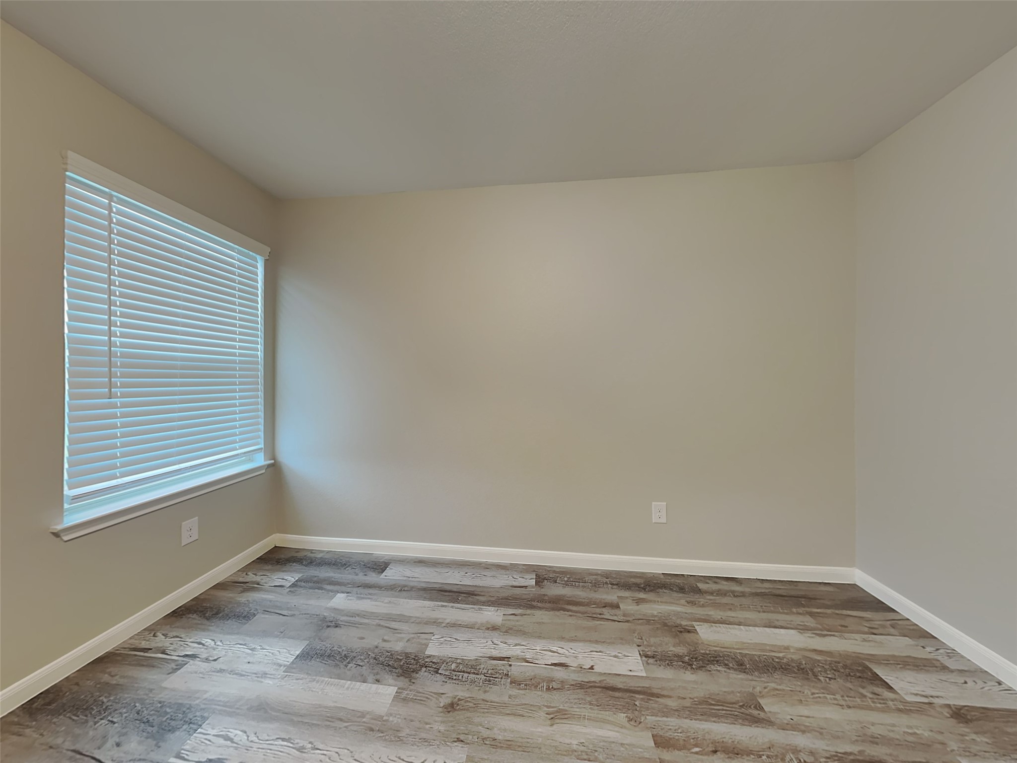 227 Murrieta Lane Rosharon, TX 77583 - Photo 12 of 16 a view of an empty room with a window