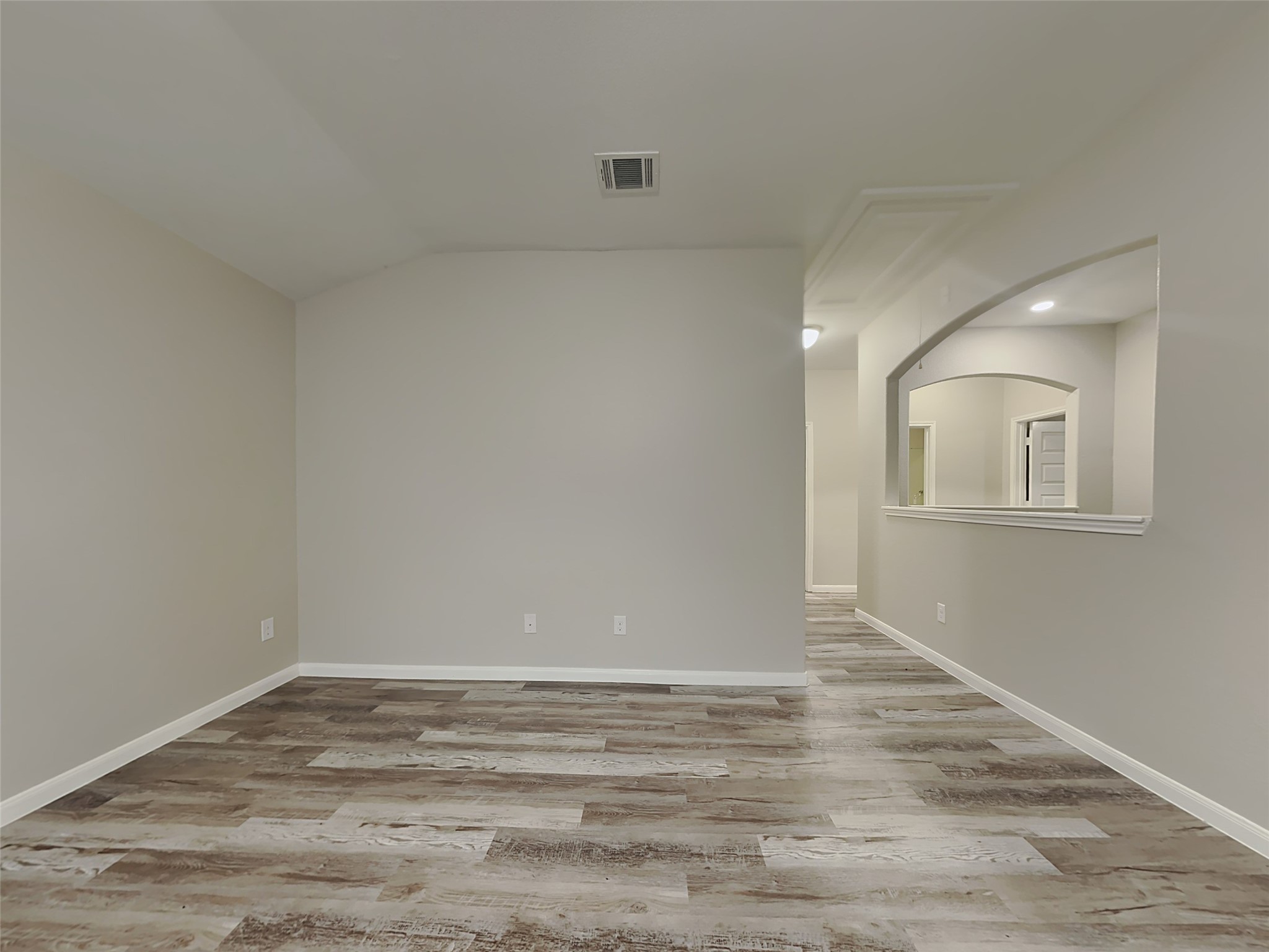 227 Murrieta Lane Rosharon, TX 77583 - Photo 14 of 16 a view of a room with wooden floor and white walls