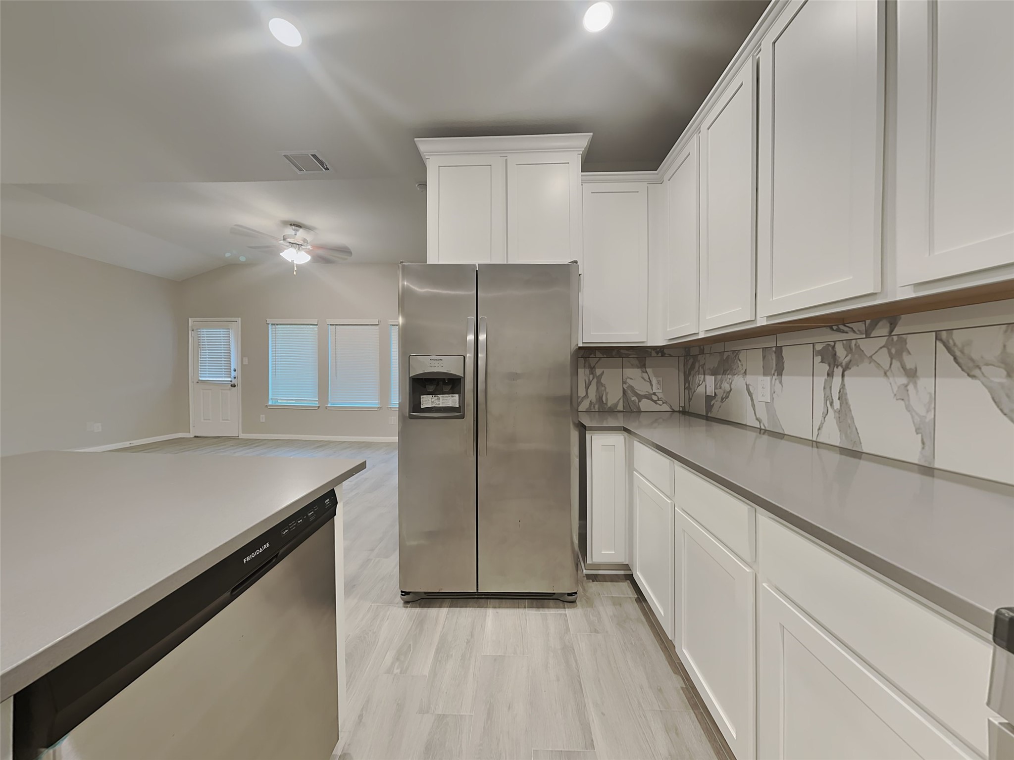 227 Murrieta Lane Rosharon, TX 77583 - Photo 5 of 16 a kitchen with cabinets and stainless steel appliances
