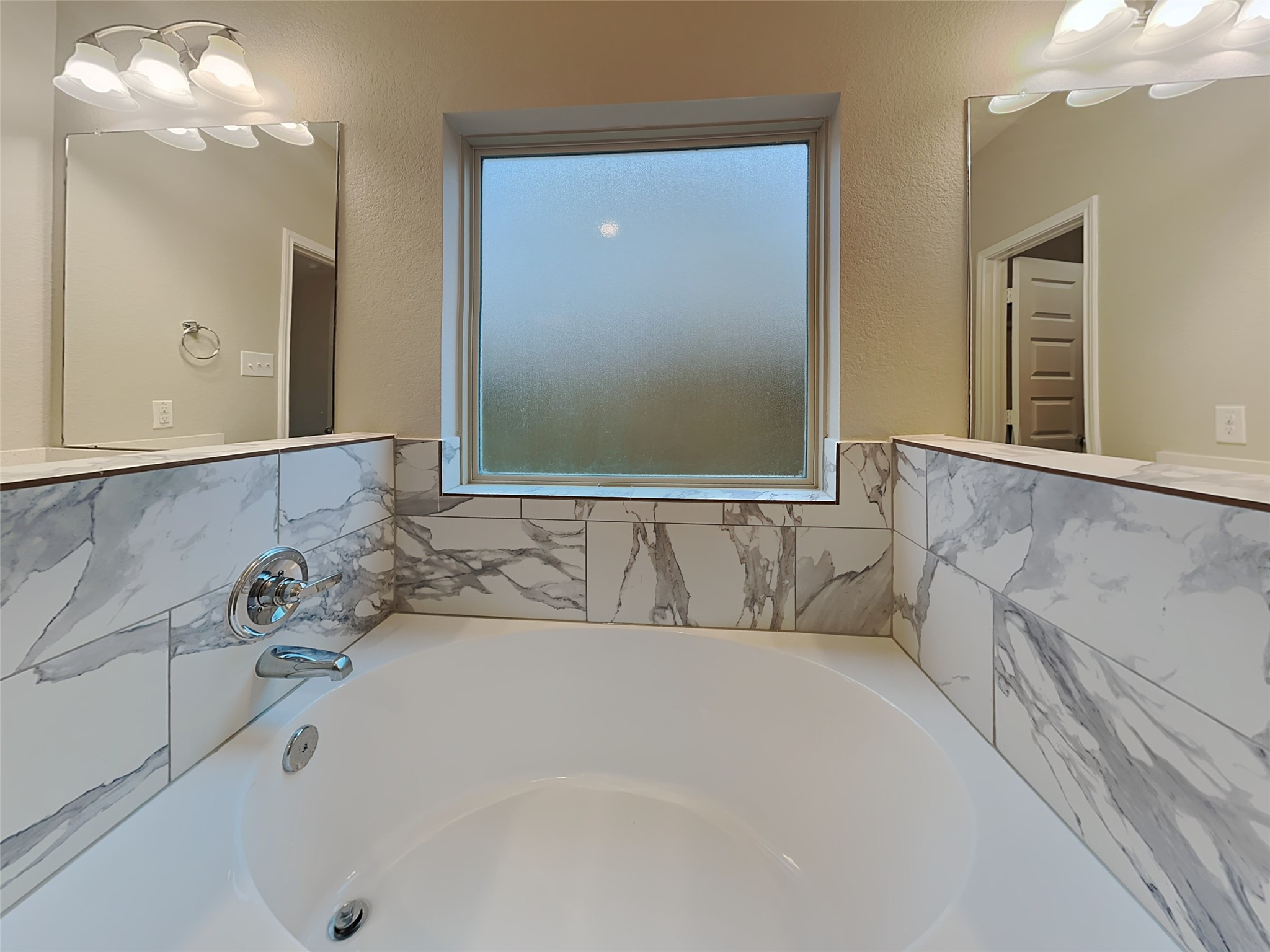 227 Murrieta Lane Rosharon, TX 77583 - Photo 9 of 16 a bathroom with a bathtub and a sink
