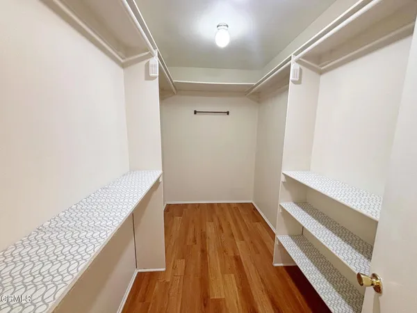 a view of small space with wooden floor