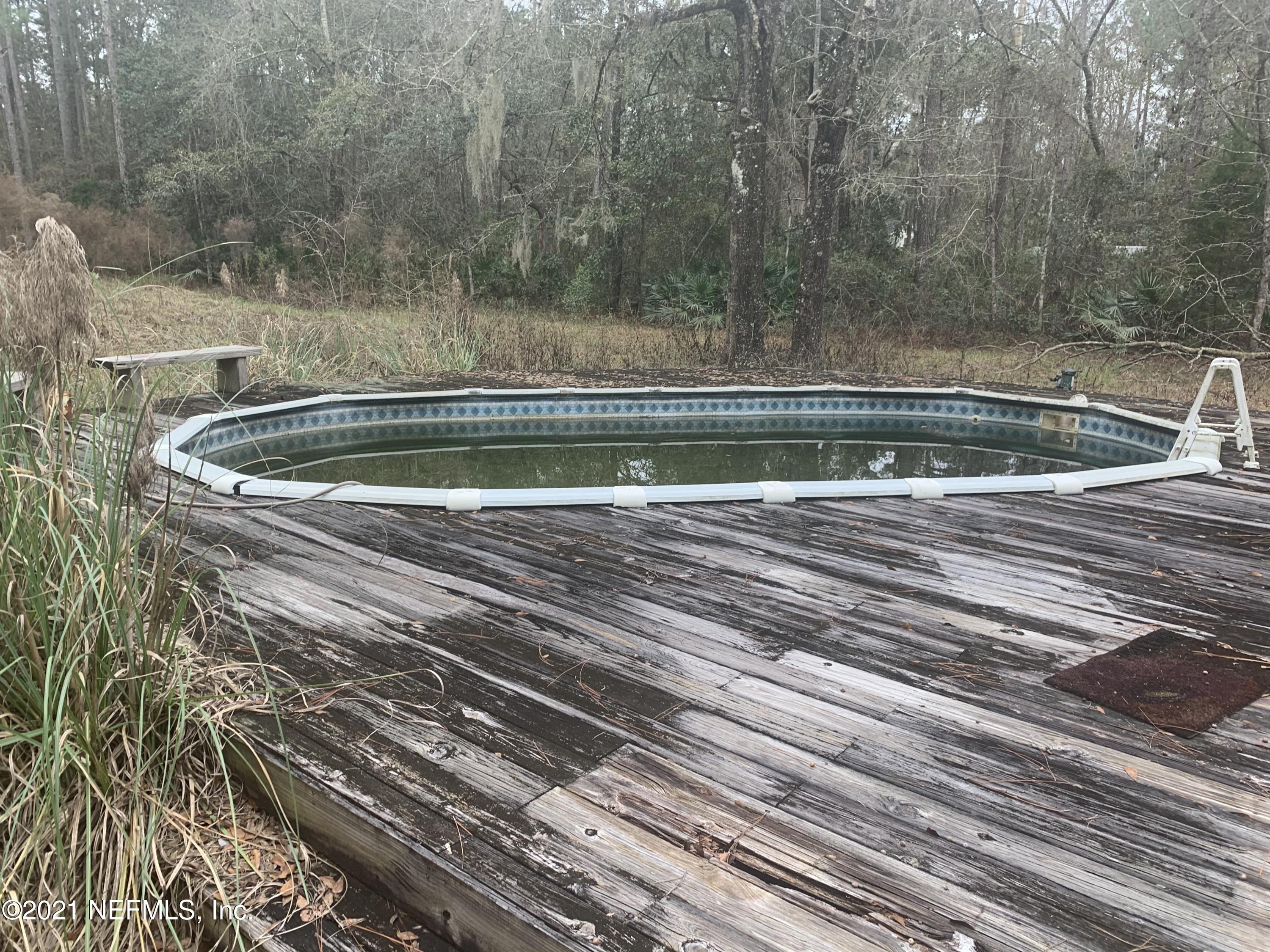 11449 Simmons Road Jacksonville, FL 32218 - Photo 2 of 6 back of Property