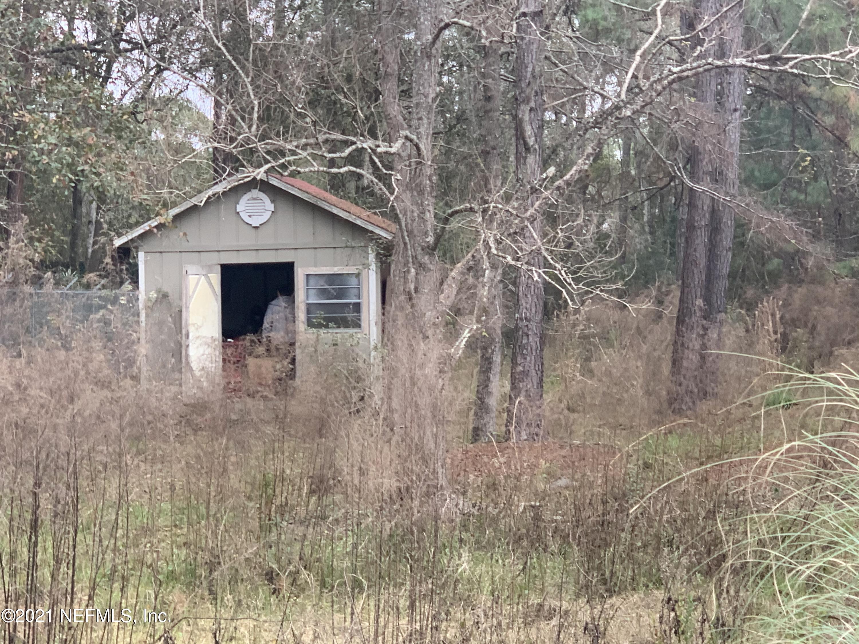 11449 Simmons Road Jacksonville, FL 32218 - Photo 3 of 6 Storage shed