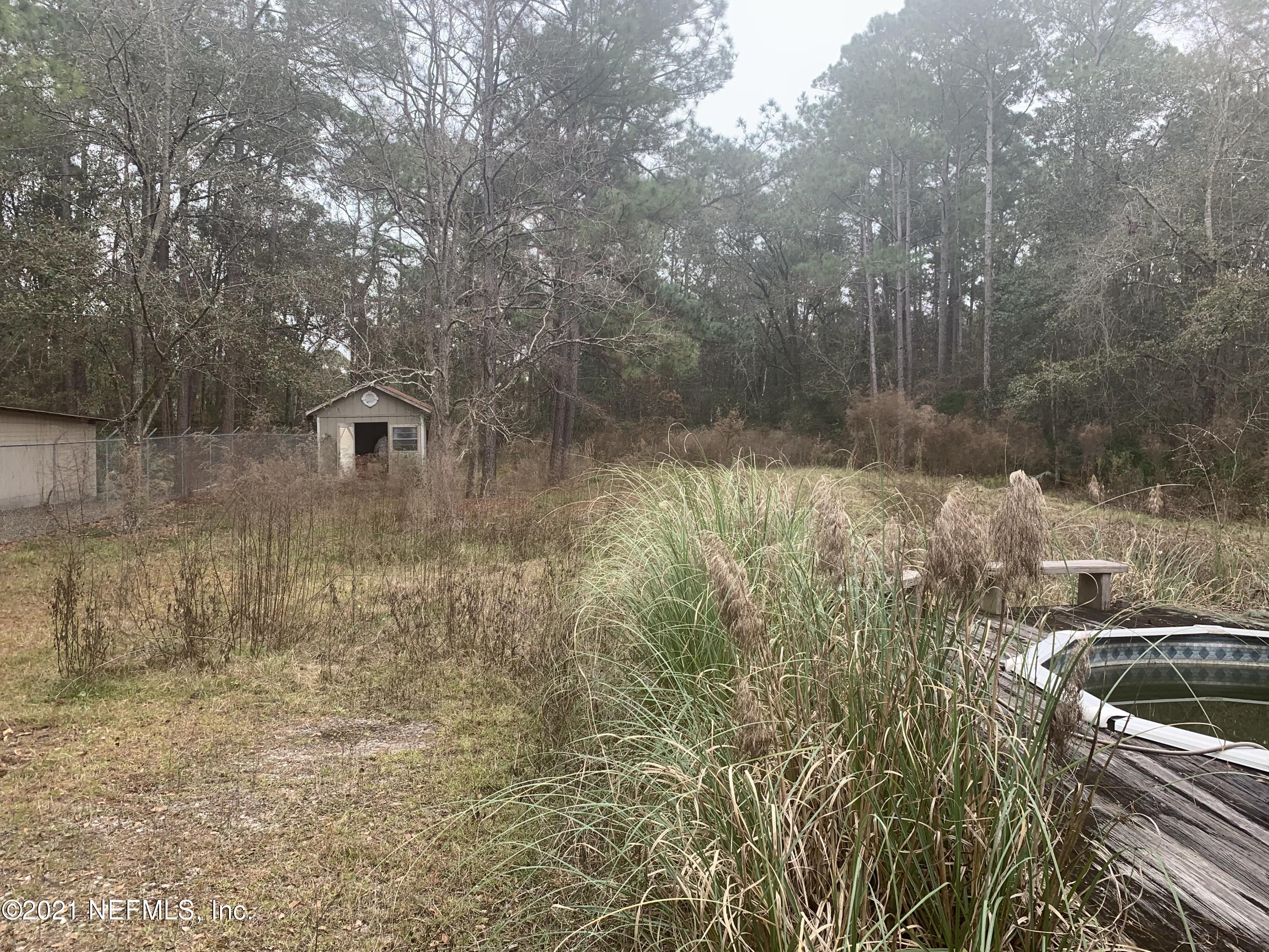 11449 Simmons Road Jacksonville, FL 32218 - Photo 4 of 6 Cleared back lot