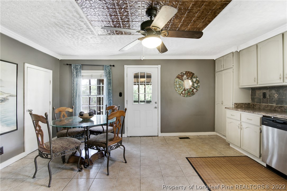 2574 Rockfish Road Raeford, NC 28376 - Photo 8 of 25 a dining room with furniture and window