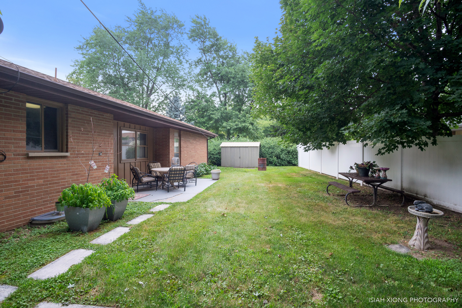 52 Neil Road Sugar Grove, IL 60554 - Photo 22 of 26 a view of a backyard with a patio