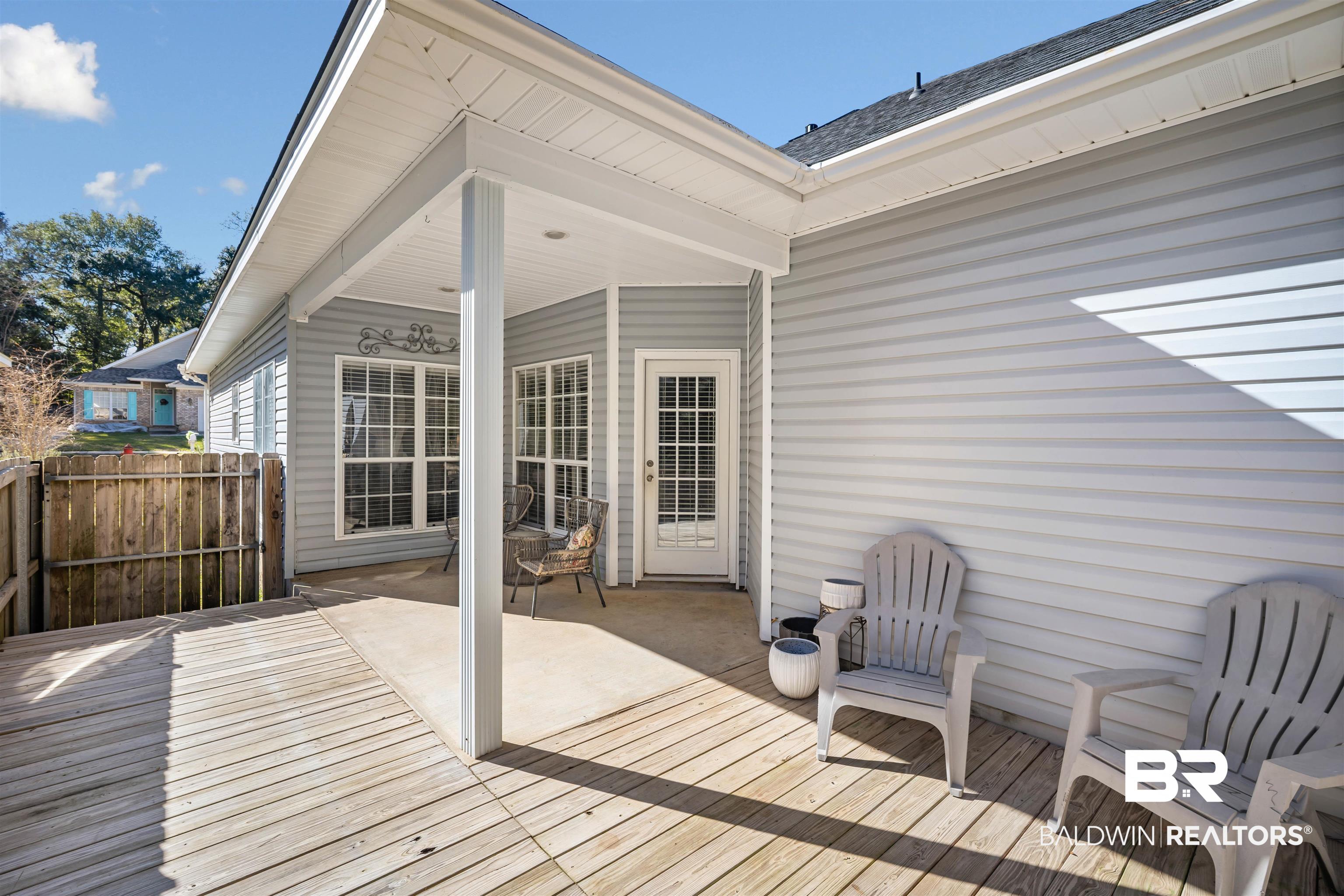 27288 Parker Lane Daphne, AL 36526 - Photo 24 of 29 Wooden terrace with a patio