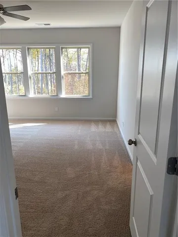 an empty room with windows