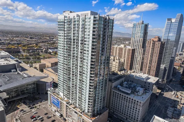 a view of a city with tall buildings