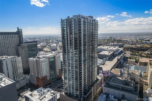 a view of a city with tall buildings