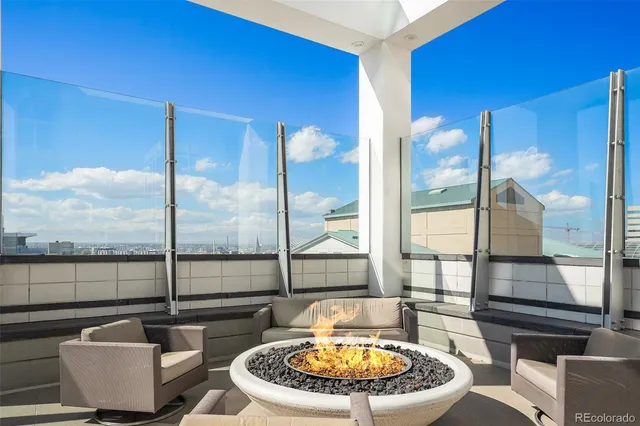 a view of a living room with furniture