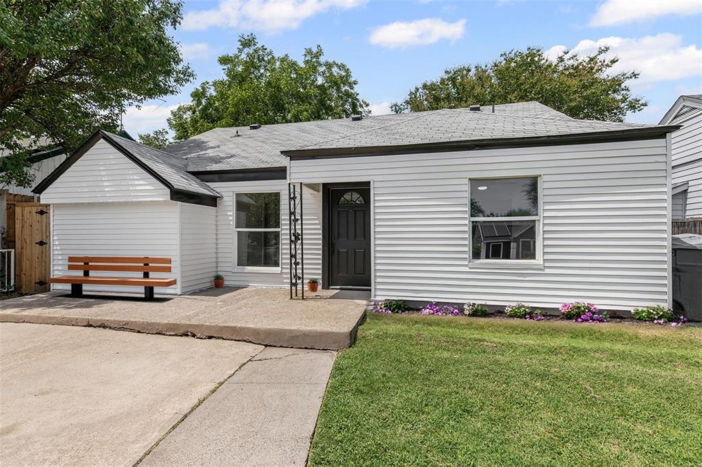 a house view with a garden space