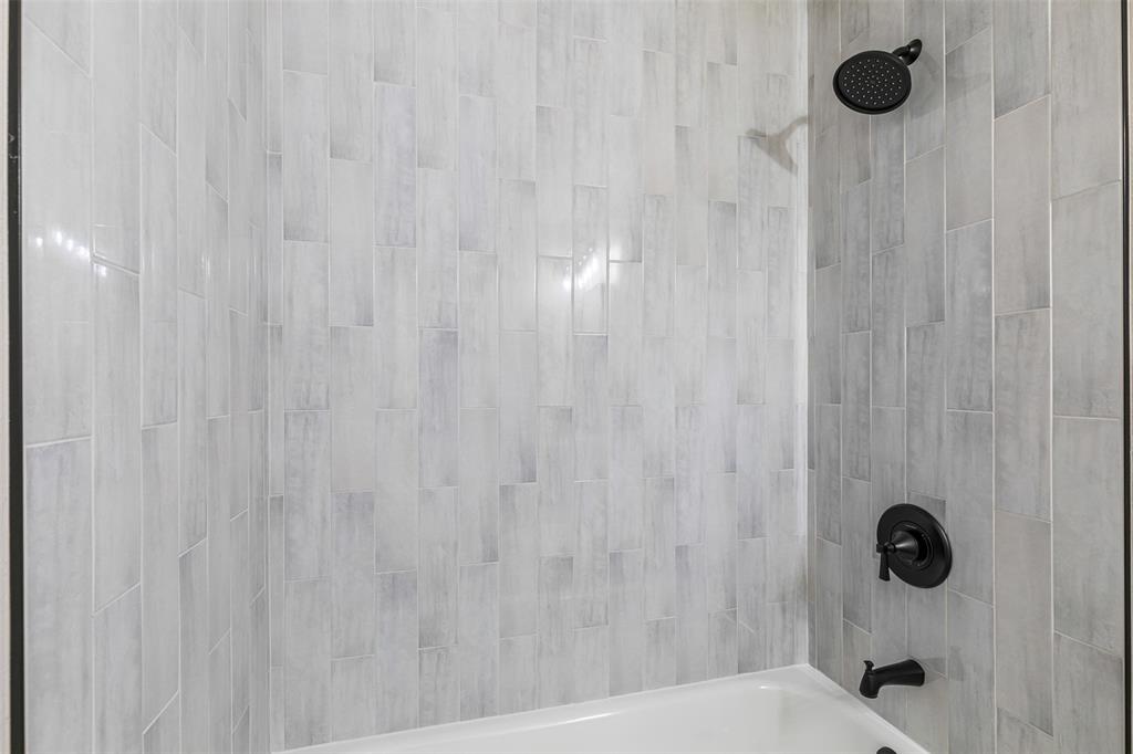 2327 Brookfield Avenue Dallas, TX 75235 - Photo 16 of 31 a bathroom with a shower