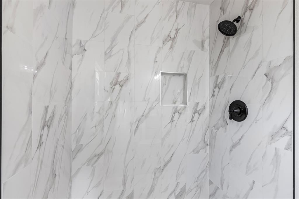 2327 Brookfield Avenue Dallas, TX 75235 - Photo 20 of 31 a close view of shower tap