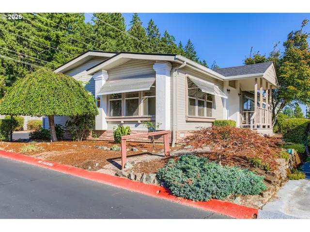 a front view of a house with yard
