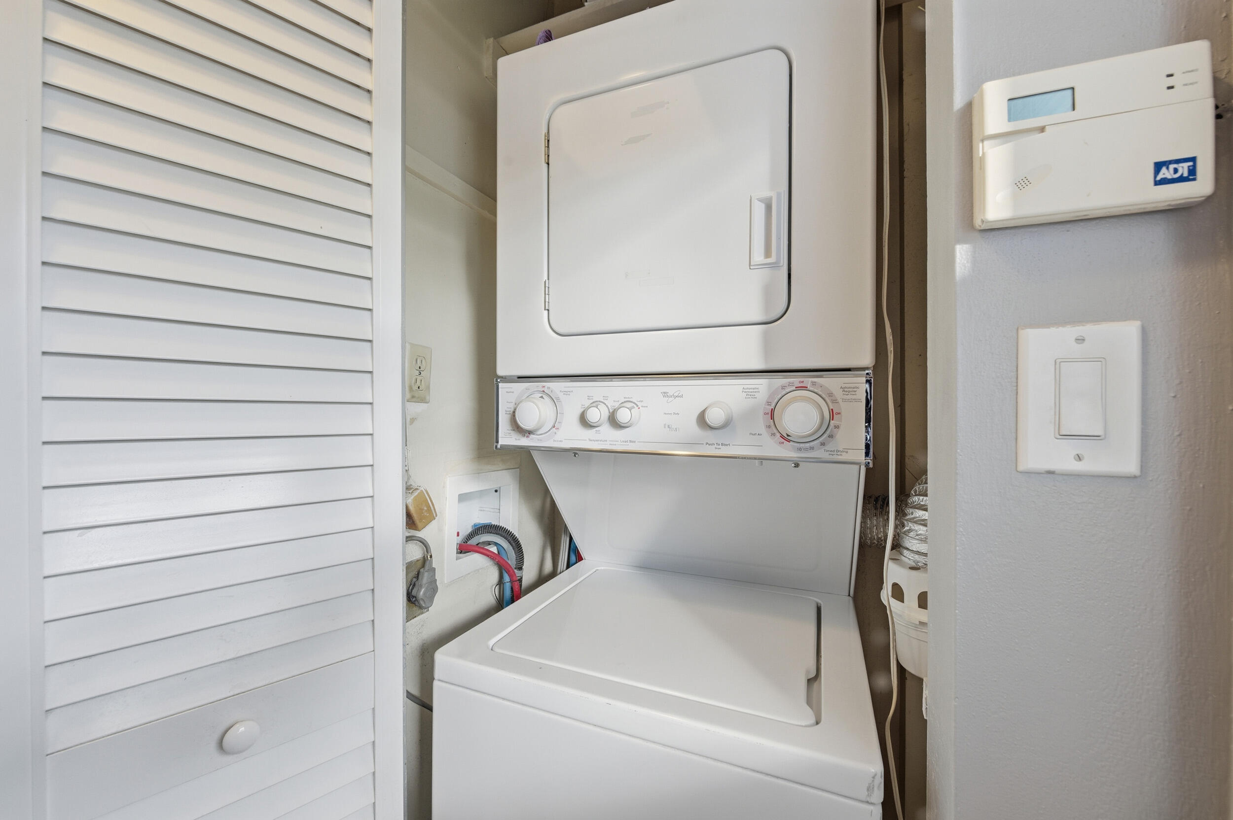2600 Fiore Way, Unit 101C Delray Beach, FL 33445 - Photo 10 of 40 a utility room with dryer and washer