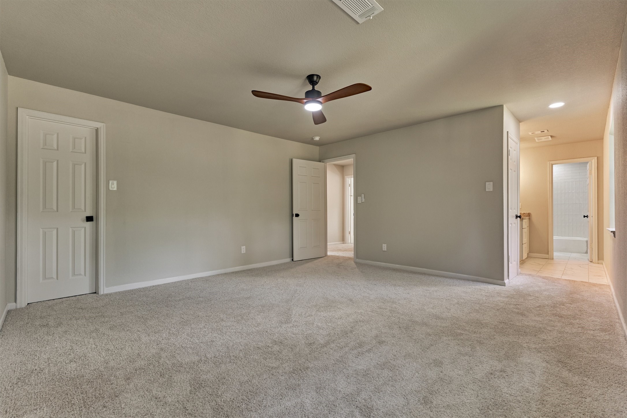 6107 Jadecrest Court Spring, TX 77389 - Photo 28 of 40 Another primary suite upstairs with ensuite bath