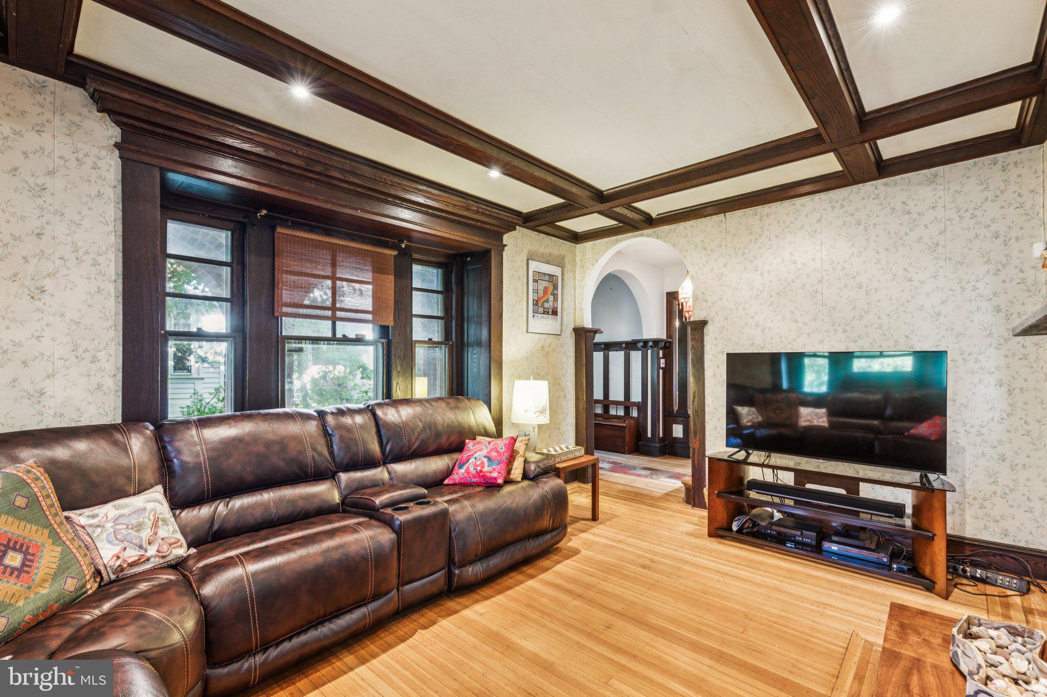 7213 Cresheim Road Philadelphia, PA 19119 - Photo 5 of 46 a living room with furniture and a flat screen tv