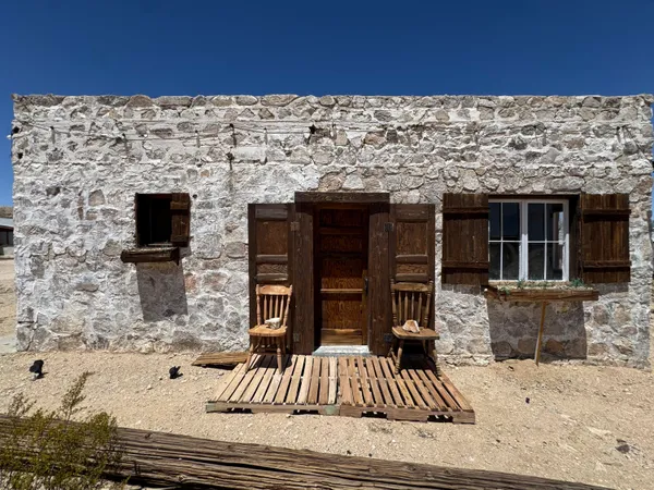 front view of a house with a patio
