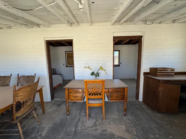 a white stove top oven sitting inside of a kitchen